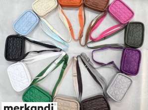 Diverse selection of women's handbags in different models and colors for wholesale from Turkey.