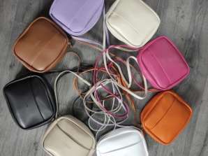 Дамски чанти на едро, предлагащи разнообразие от цветове и модели.