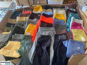 GYMSHARK didmeninės prekybos likvidavimo sportinių drabužių padėklai