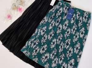 020018 faldas plisadas de AJC y Tom Tailor. Dos modelos: negro y verde con estampado floral