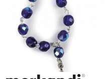 Rosary tithe with blue glass beads and a silver cross.