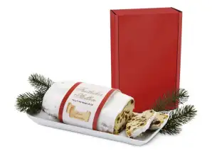 Christstollen im roten Geschenkkarton   Traditioneller Weihnachtsgenuss