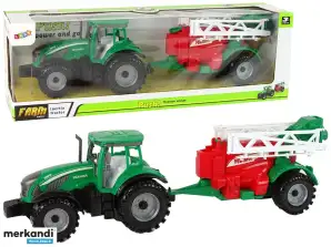 Grüner Ackerschlepper mit rot-grünem Sprüher-Reibungsantrieb