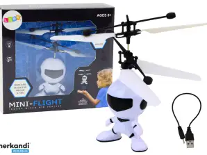 Astronauta volante drone controllato a mano elicottero bianco