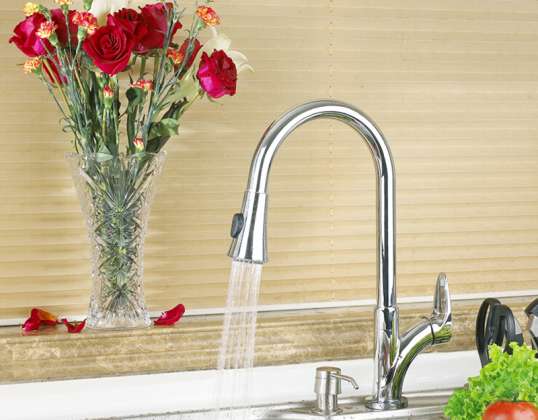 Chrome-plated kitchen mixer with hand shower and swivel spout