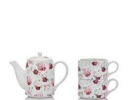 Pichet en porcelaine avec deux tasses dans un motif de fleurs ou un motif de points