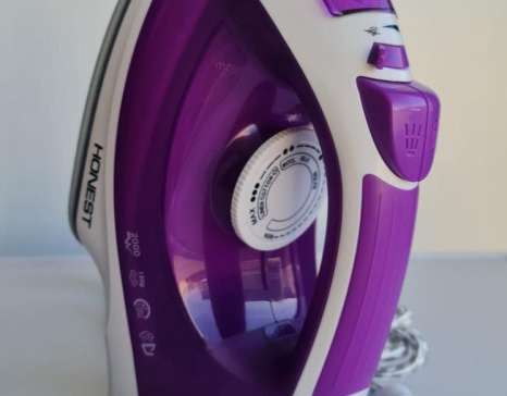 New in box clothes iron with steam, dry, spray and adjustable temperature controls