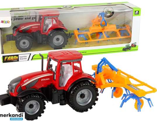 Punane reha hõõrdeajamiga traktor
