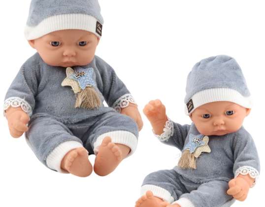 Vauvanukke harmaassa pyjamassa tähtihatulla