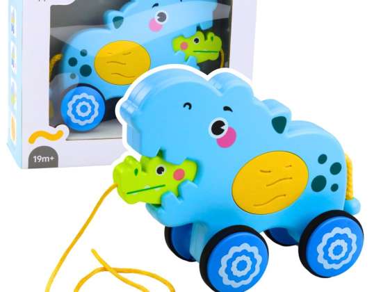 Hipopótamo en una cuerda montando para tirar para un niño pequeño Suena azul