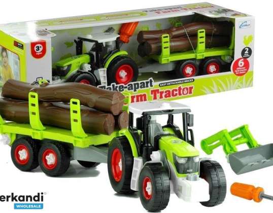 Tractor desmontado con remolque con madera 43 cm