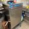 Auction: Industrial dishwasher (on a stainless steel base) image 1