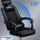 Black ergonomic office chair with footstool image 1