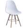 Shell chairs in three different colours and reinforced wooden frame image 3
