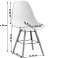 Shell chairs in three different colours and reinforced wooden frame image 5