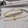 Conjunto compuesto por pulsera y collar en forma de corazón fabricado en acero inoxidable fotografía 2