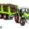 Tractor desmontado con remolque con madera 43 cm fotografía 1