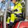 High-visibility softshell work jacket with hood yellow size L image 1
